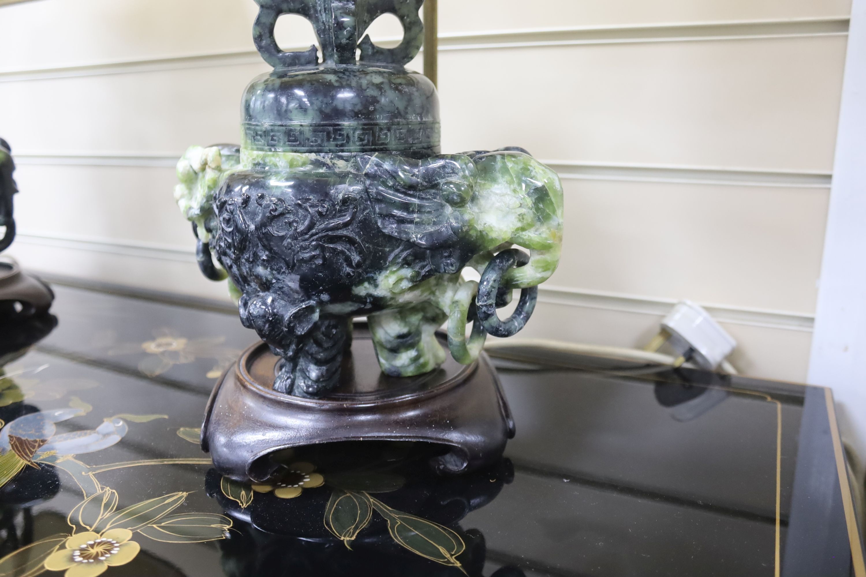 A pair of mid 20th century Chinese hardstone tripod censers on lamp stands, including stand 30 cms high.
